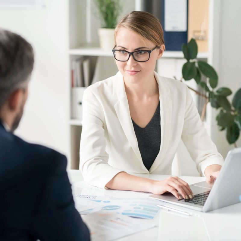 content attractive female business consultant working with clien 1 1