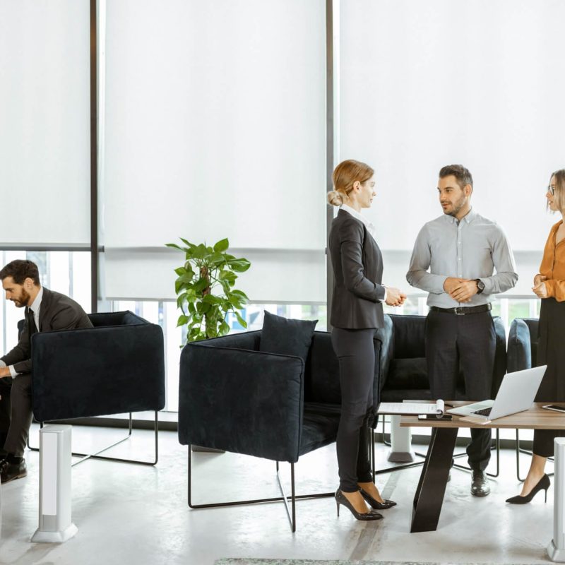 couple with business consultants at the office